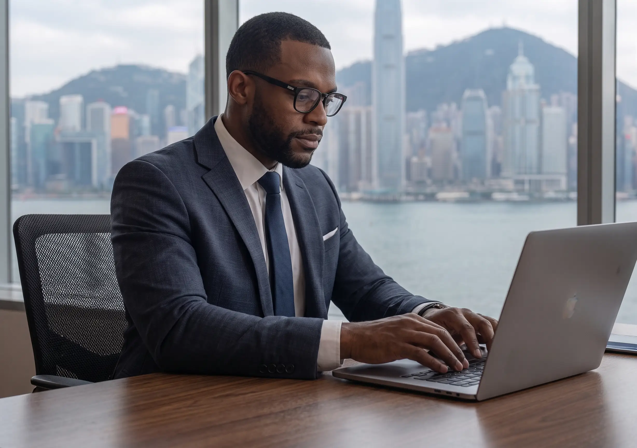 International consultant working on laptop