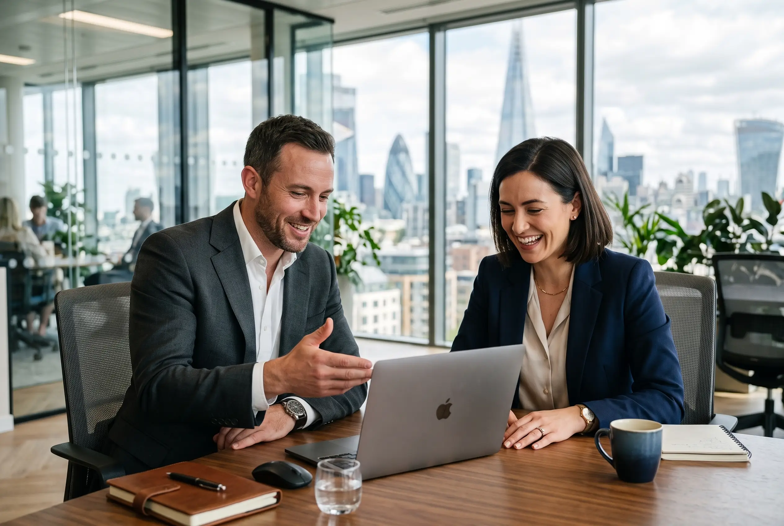 wealth manager and corporate executive discussing offshore investment strategy in modern glass office